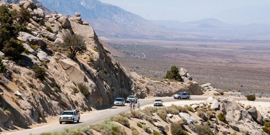 An image of crew members parked along the road at Badwater 135.