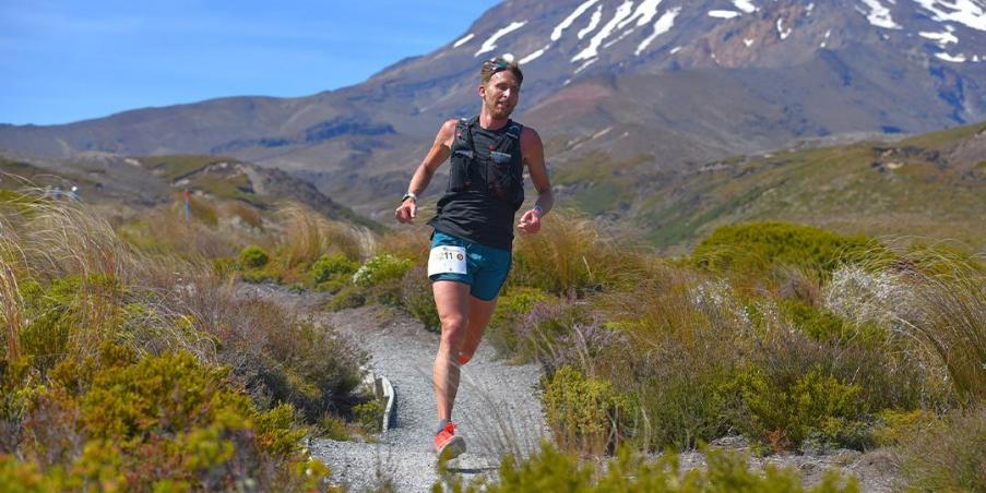 Injinji Athlete Zac Marion running the epic Tussock Traverse in New Zealand. 