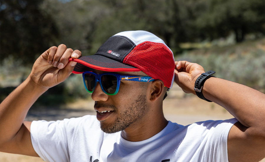 Man wearing wearing Injinji's newest gear, the active cap. 